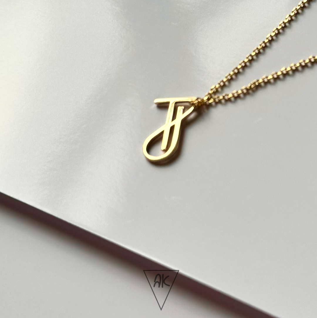 Pendentif initiales entrelacées en or 18k – bijou sur mesure pour couple